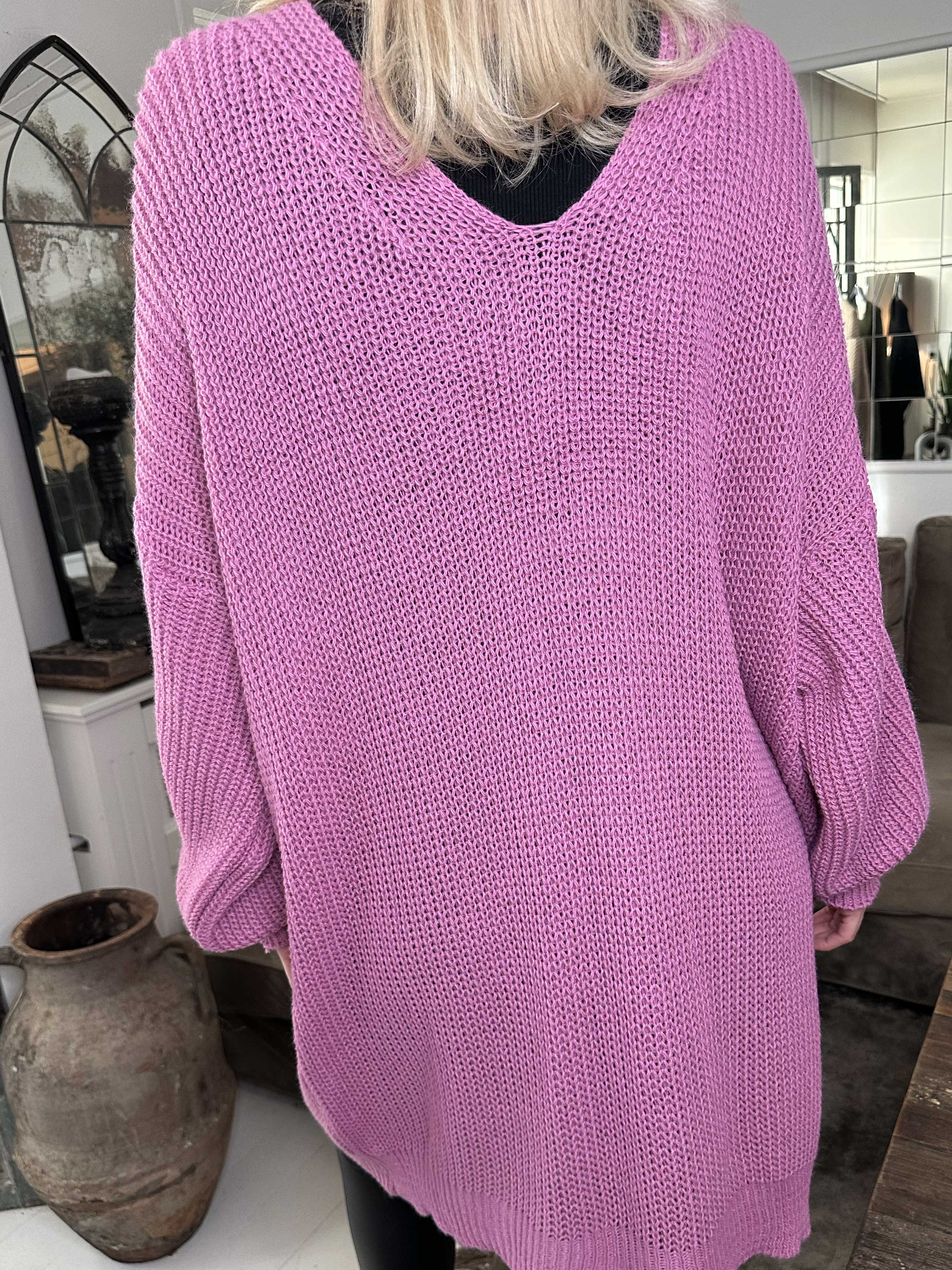 Diana - Fin stickad klänning med ballongärmar och rosetter